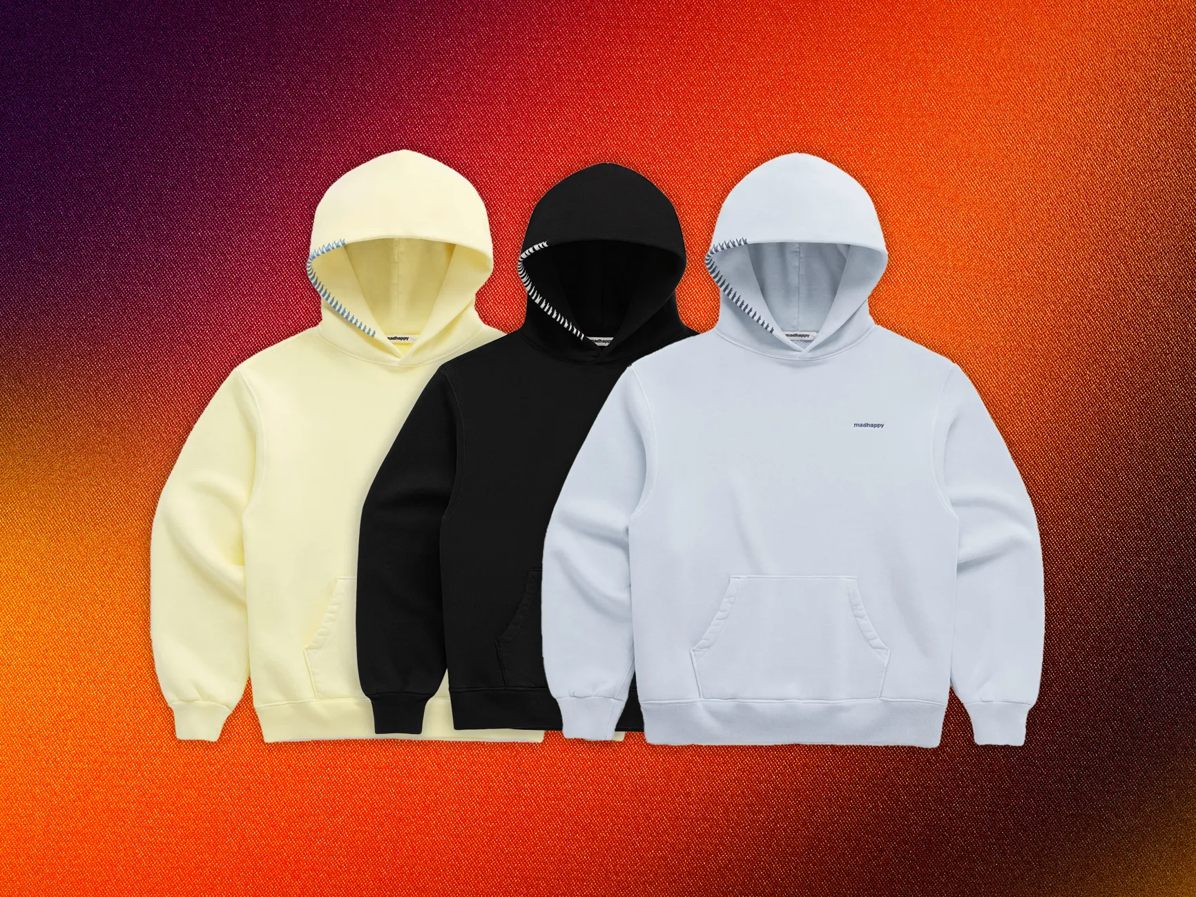 Front Page -Saintbernard Shop MadHappy Classics Fleece Hoodie yellow black blue Abstract Background 022025 SOURCE MadHappy